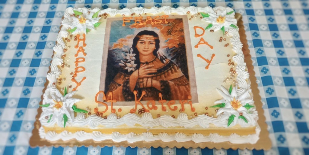 The Anchorage Kateri Circle celebrates the Feast of St. Kateri with a cake.