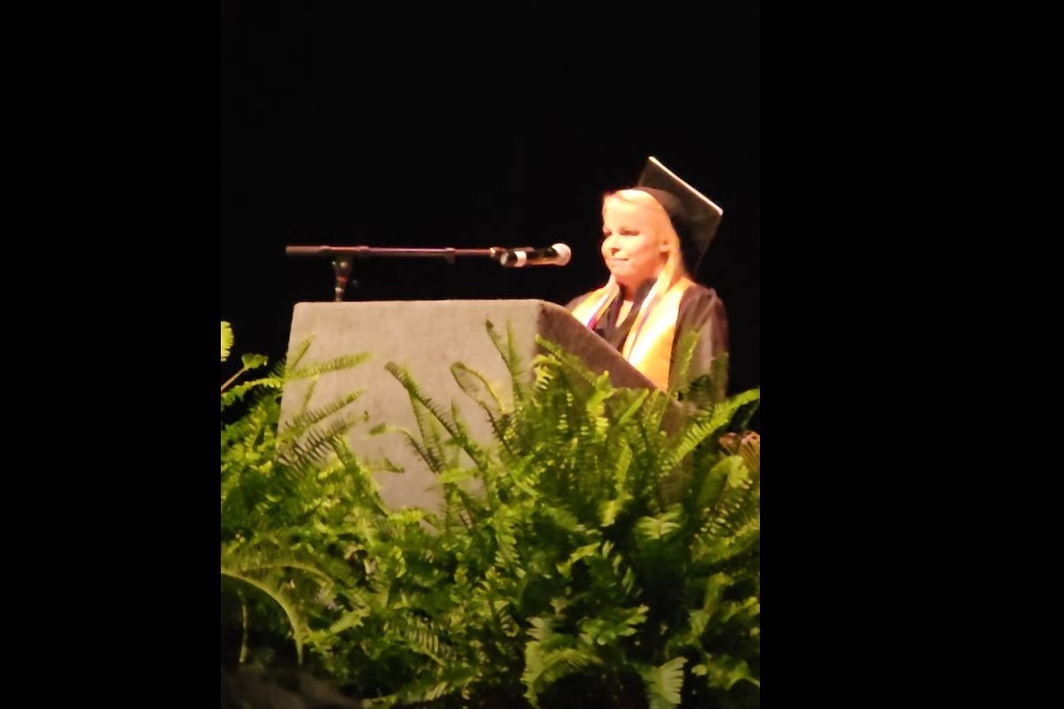 Ashley Payne addressing graduation ceremony