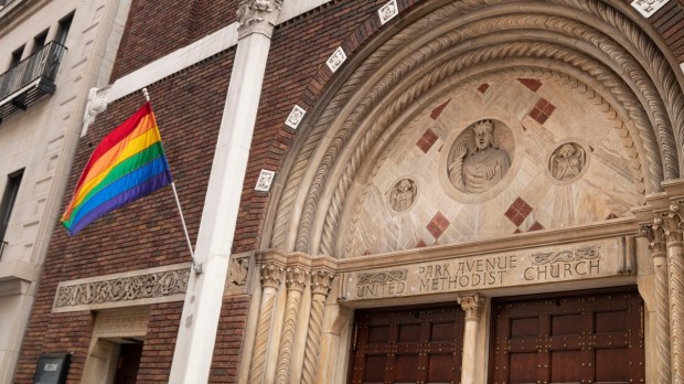 LGBTQ flag on Methodist church