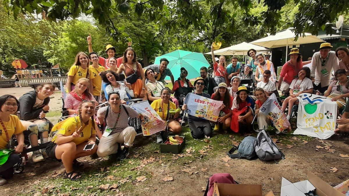 Group of young people posing for a photo at WYD 2023 Lisbon