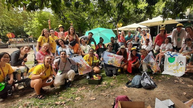 Group of young people posing for a photo at WYD 2023 Lisbon