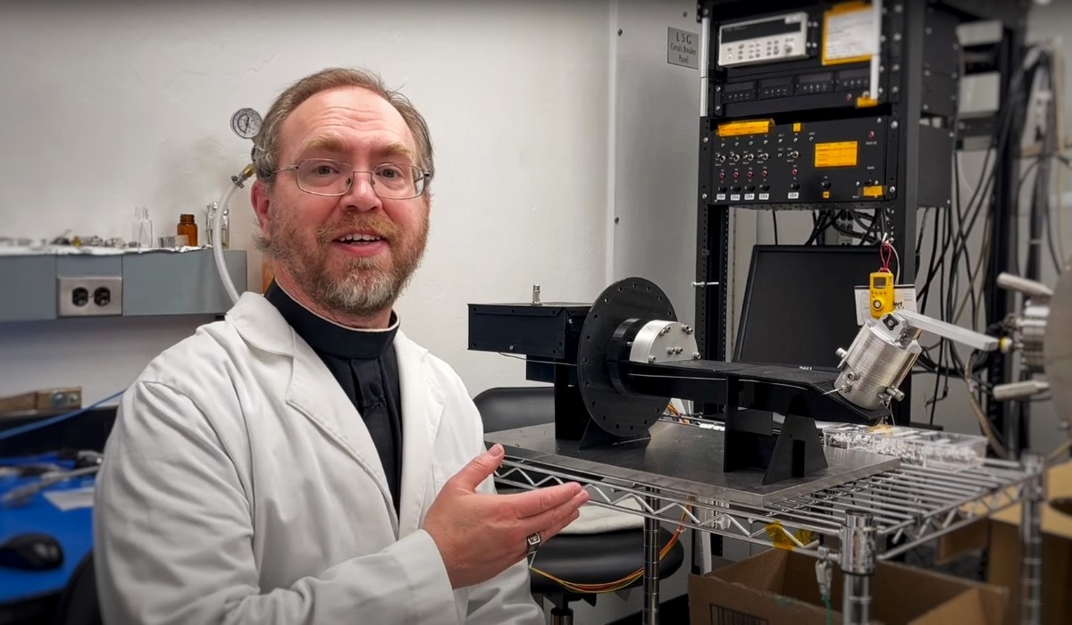 Brother Bob Macke shows off Pycnometer for NASA OSIRIS-REx Mission