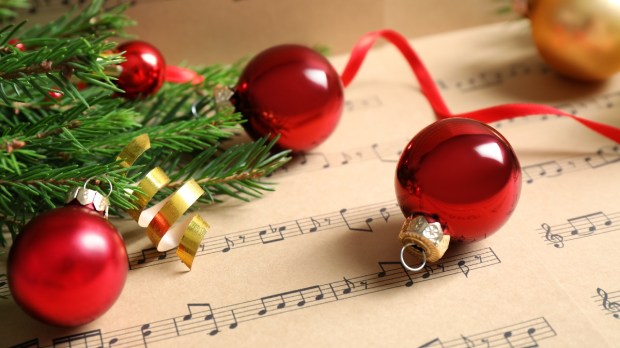 Christmas decorations on sheet music