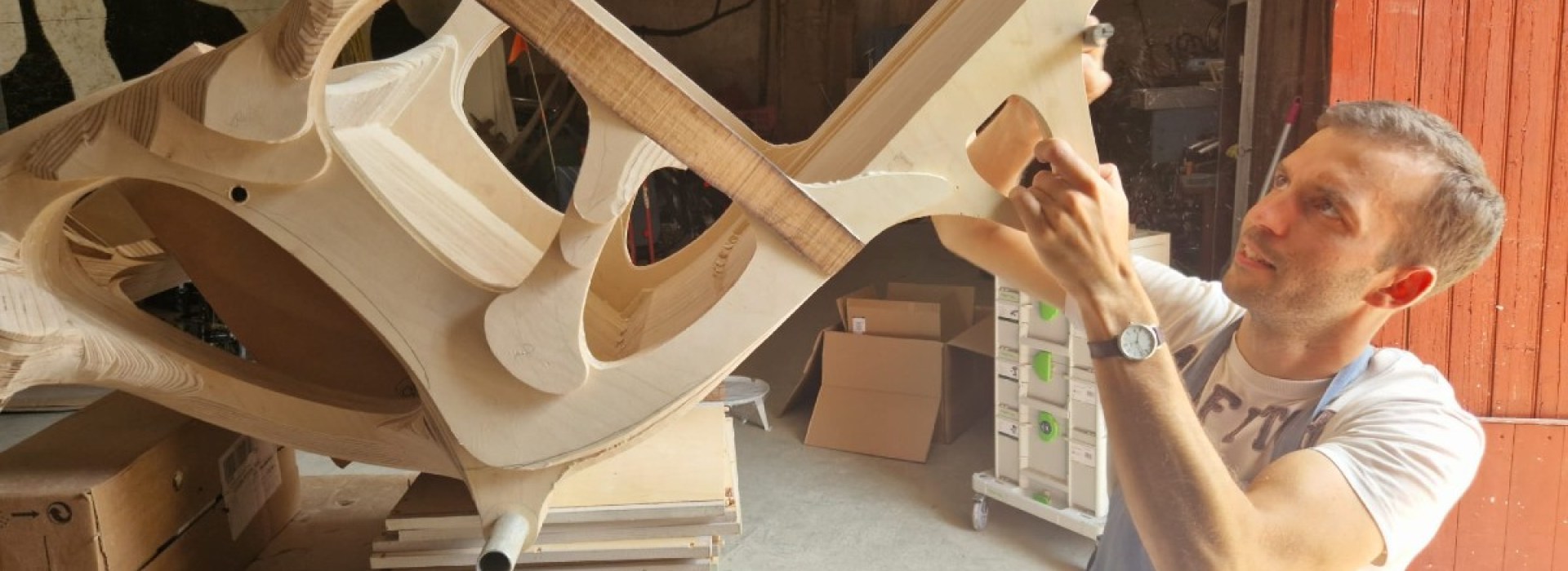 Paul de Livron working on a wooden wheelchair for Pope Francis