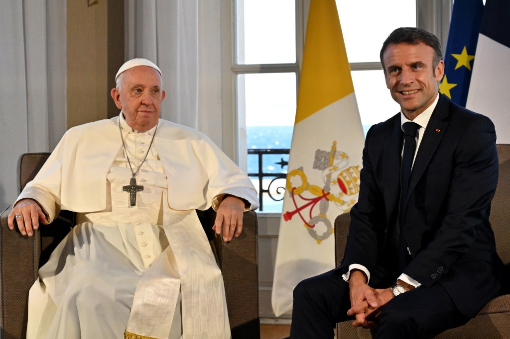 Pope Francis (L) meets with French President Emmanuel Macron at the Palais du Pharo in the southern port city of Marseille