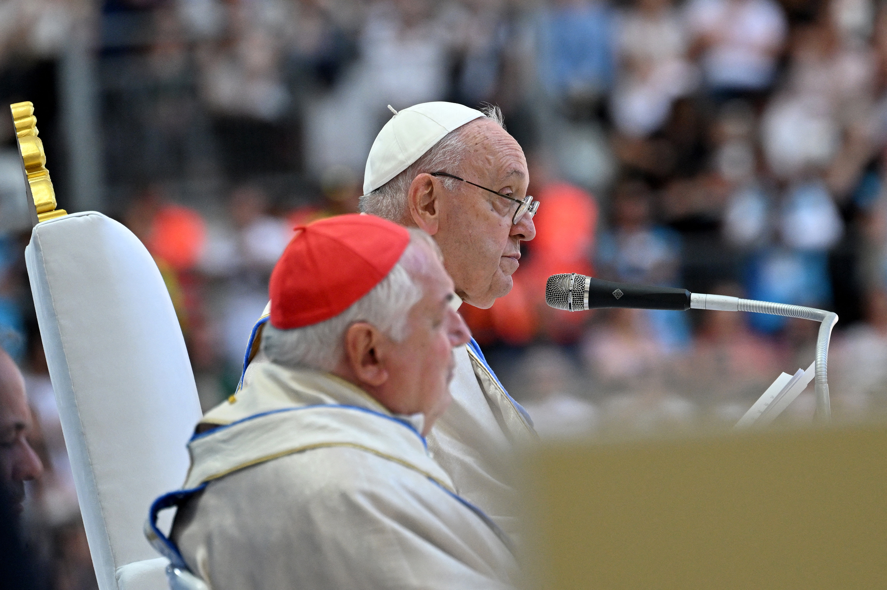 Pope Francis waves as he arrives to celebrate mass at the Velodrome stadium in the southern port city of Marseille
