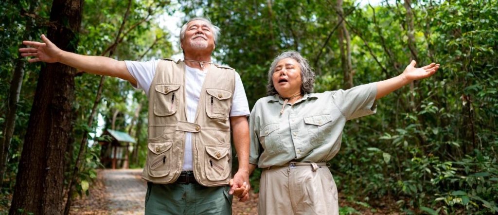 Elderly-Japanese-couple-enjoying-nature-on-walk-e1697850767712.jpg