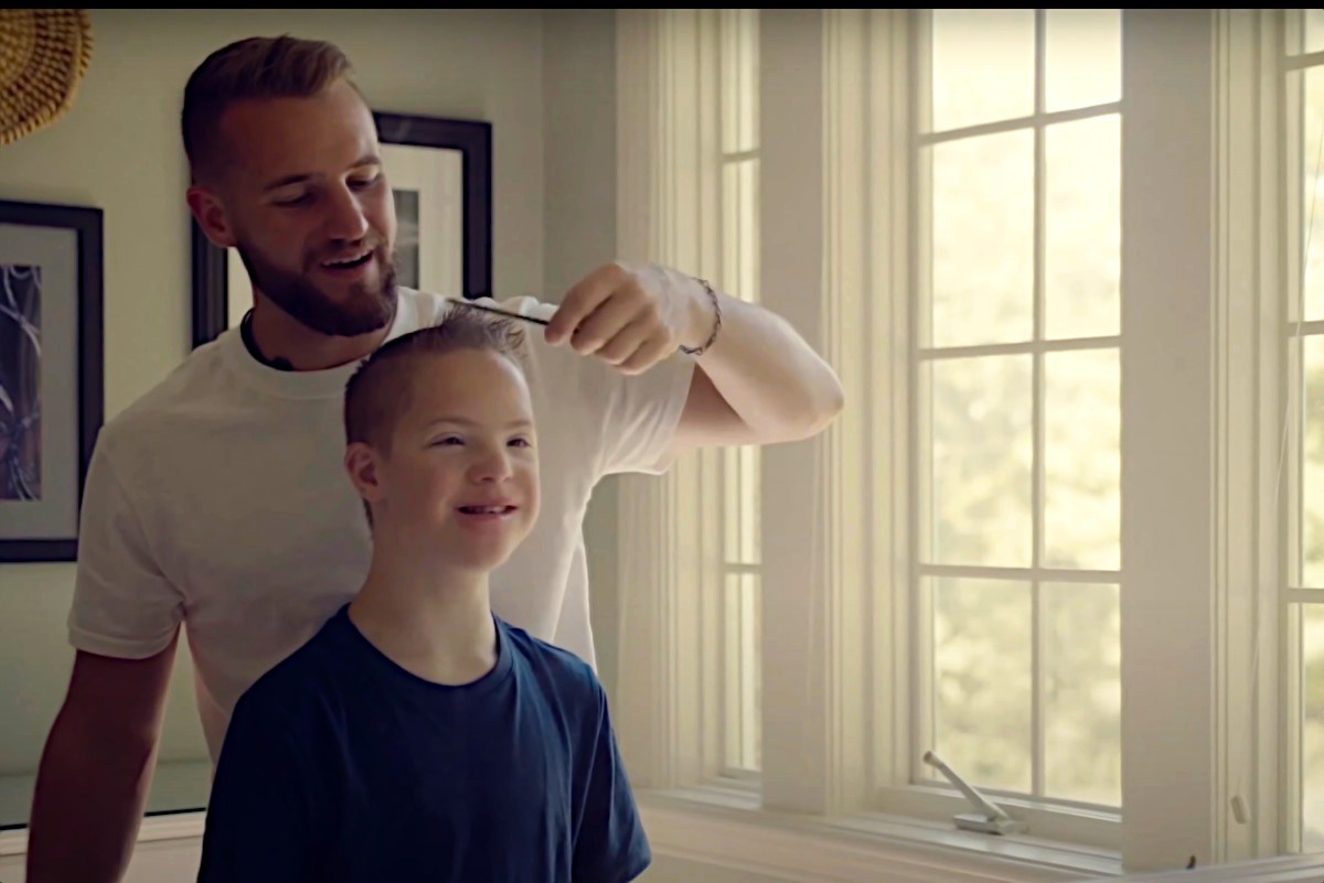 Still from video for John Paul Von Arx song "He's Different," about his little brother who has Down syndrome