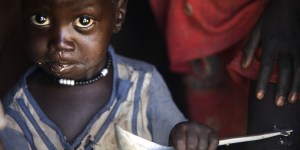 Boy in South Sudan gets food