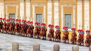 Swiss guard marching up hill