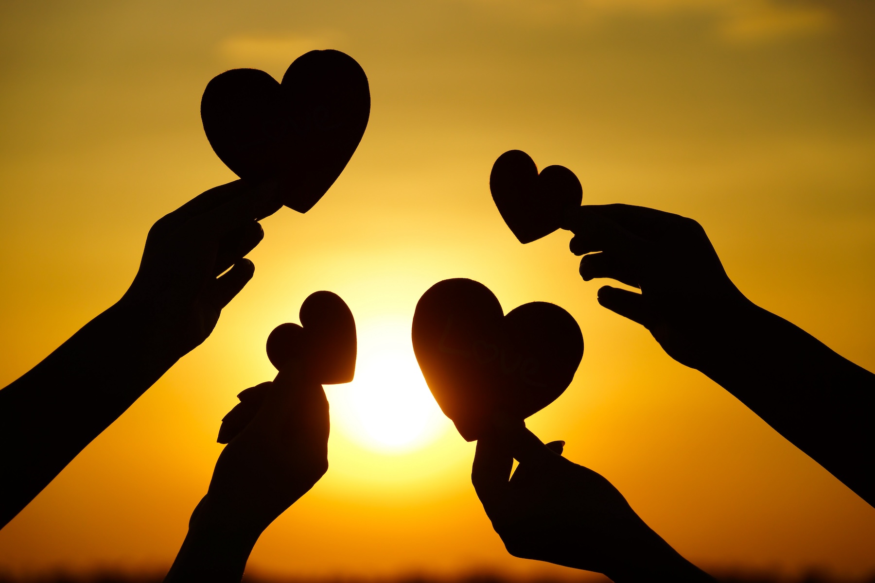 hands heart sunset family