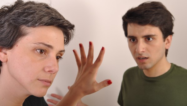 angry brother yelling at her older sister