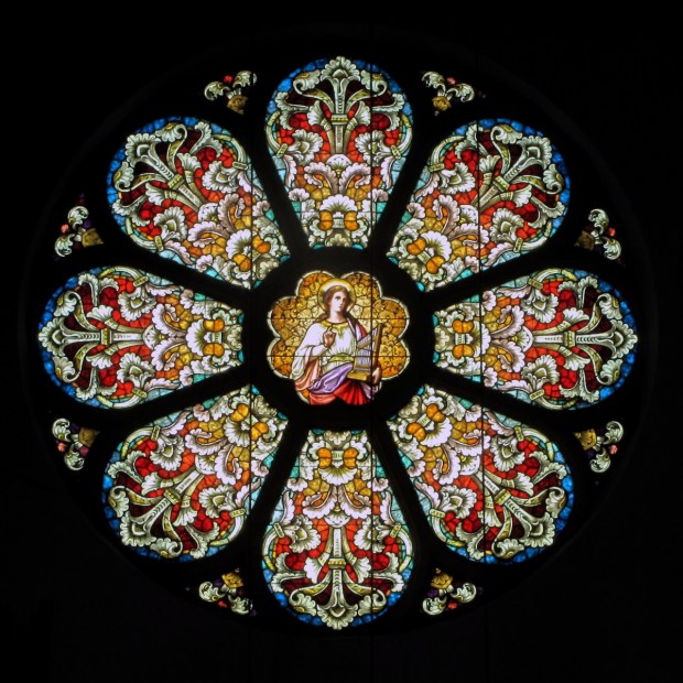 A rose window by Frei & Associates in the Arcadia Academy, Arcadia, MO.