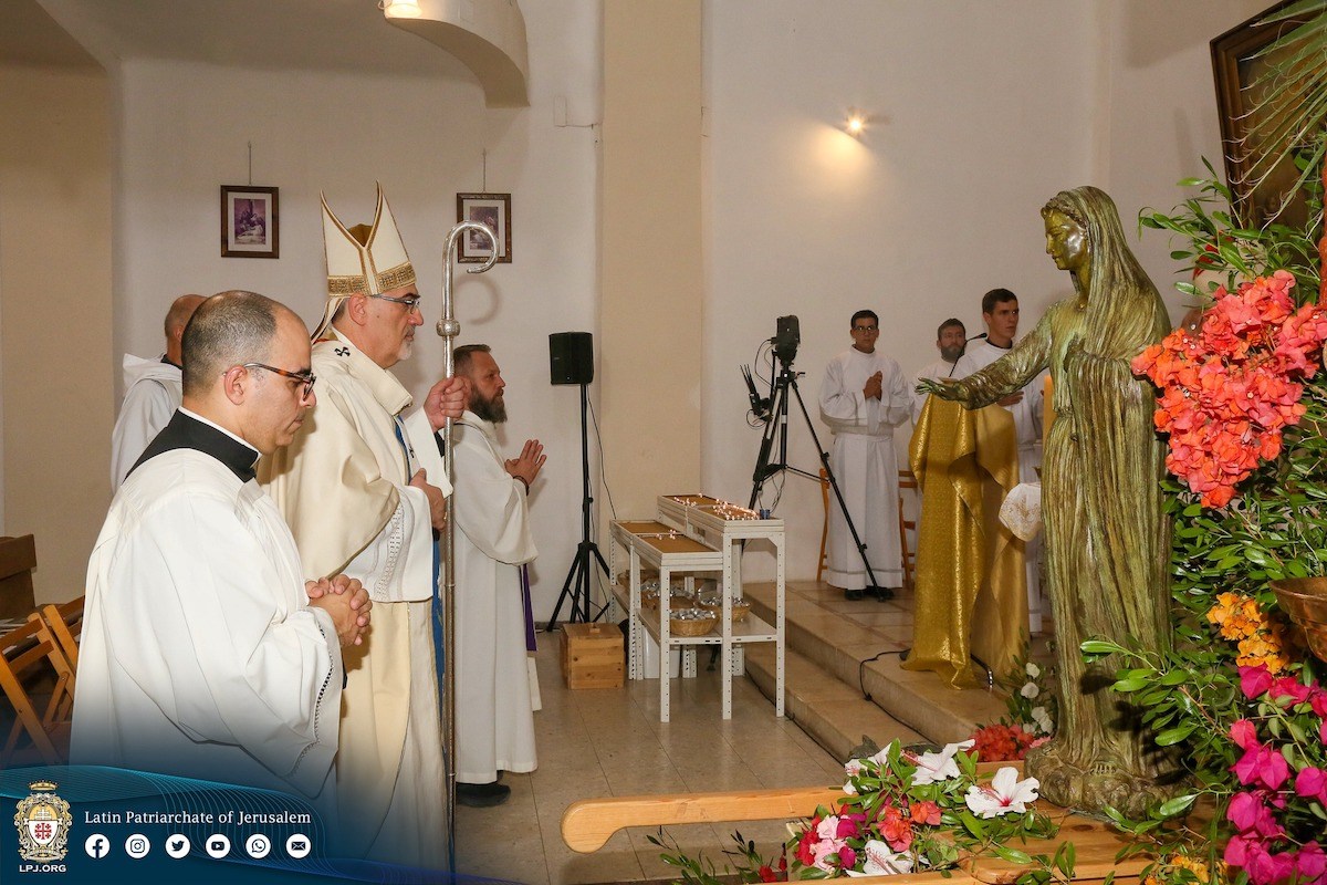 Latin Patriarch of Jerusalem Pierbattista Pizzaballa prays before Our Lady Queen of Palestine statue