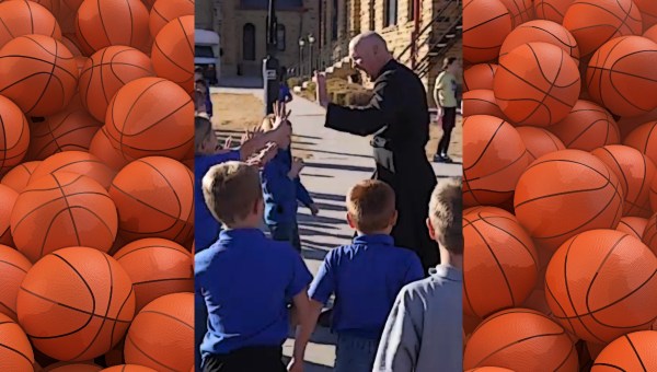 Priest makes trick basketball shot