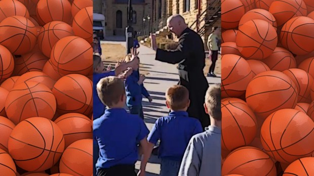 Priest makes trick basketball shot