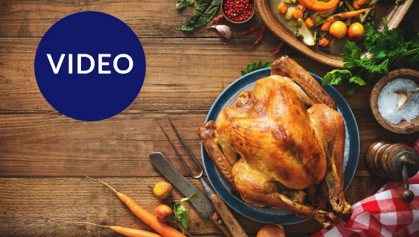 Thanksgiving table set with "Video" graphic