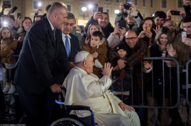 Pope Francis stops in front a nativity scene in St. Peter's Square after presiding over the first Vespers and the 'Te Deum'