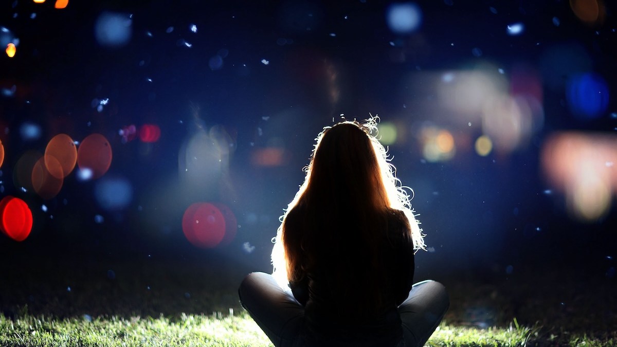 lights in darkness hope twinkles Christmas girl