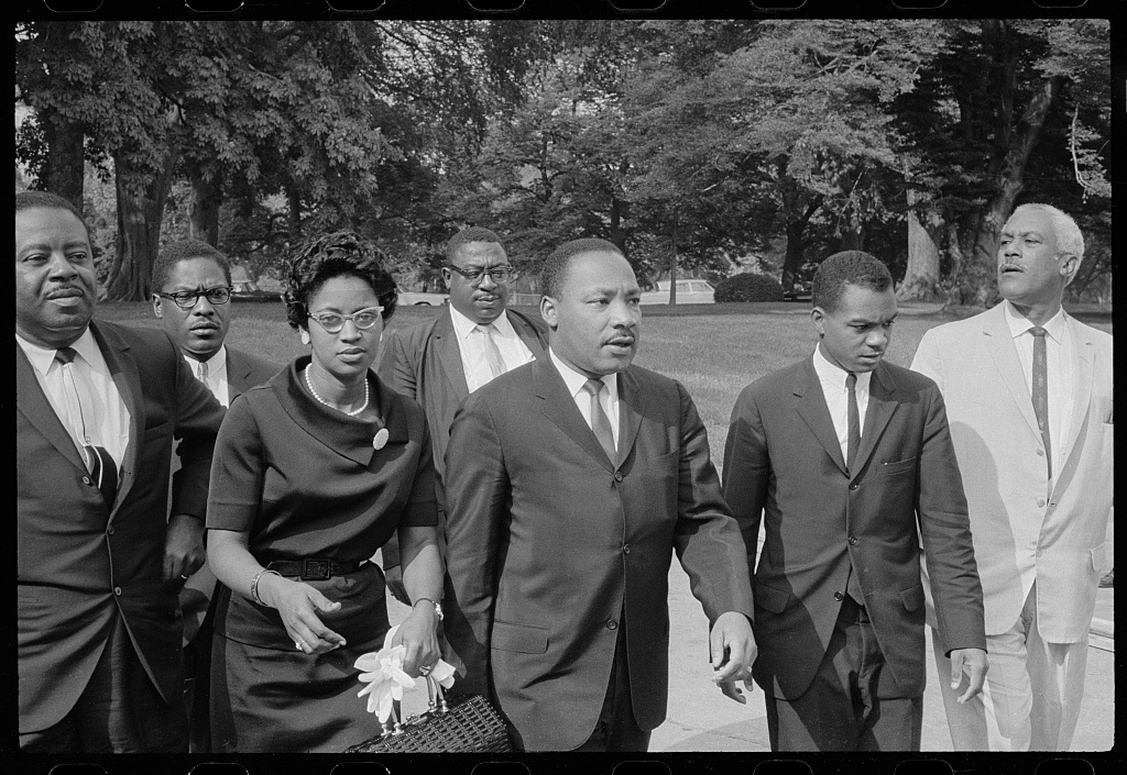 Martin Luther King Jr. heads to a meeting with President Lyndon Johnson in Washington, D.C.