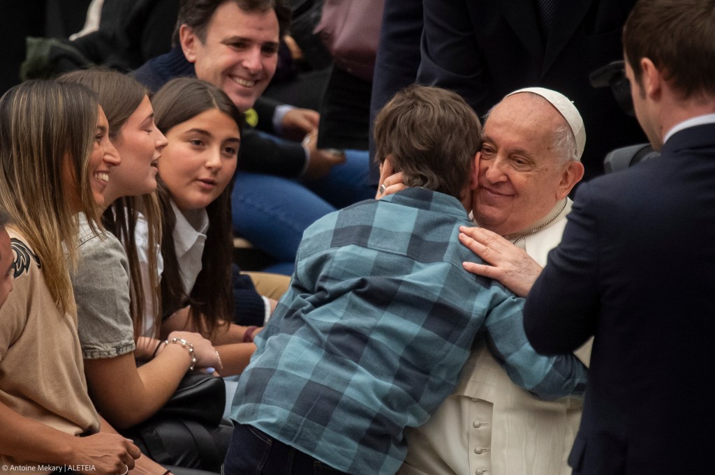Pope Francis as he blesses a Child at the end of his weekly general audience Paul VI hall in the Vatican