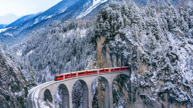 Switzerland winter snow mountains train