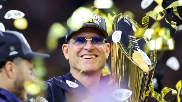 Head coach Jim Harbaugh of the Michigan Wolverines celebrates after defeating the Washington Huskies during the 2024 CFP National Championship game