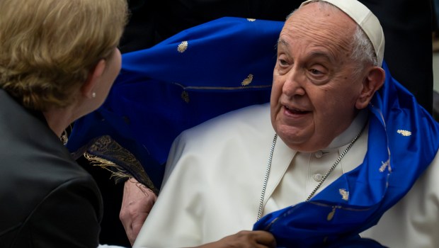Pope Francis blesses faithful at the end of his weekly general audience in Paul VI Hall