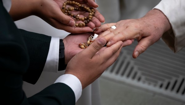 Pope Francis blesses the faithful at the end of his weekly general audience in Paul VI Hall