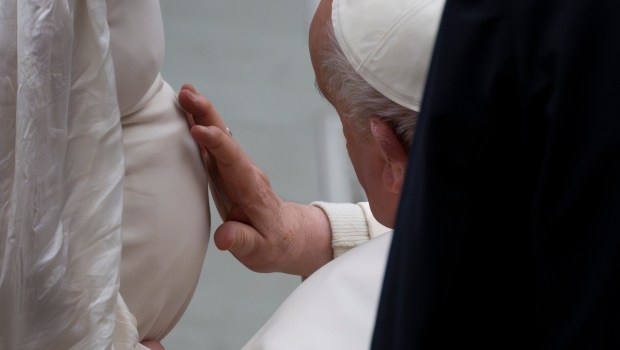 Pope Francis blesses faithful at the end of his weekly general audience in Paul VI Hall at the Vatican on February 14, 2024