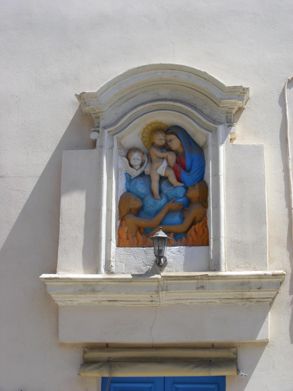 Relief-of-Madonna-and-Child-and-Souls-in-Purgatory-in-Qormi.-Wikimedia-commons.jpeg