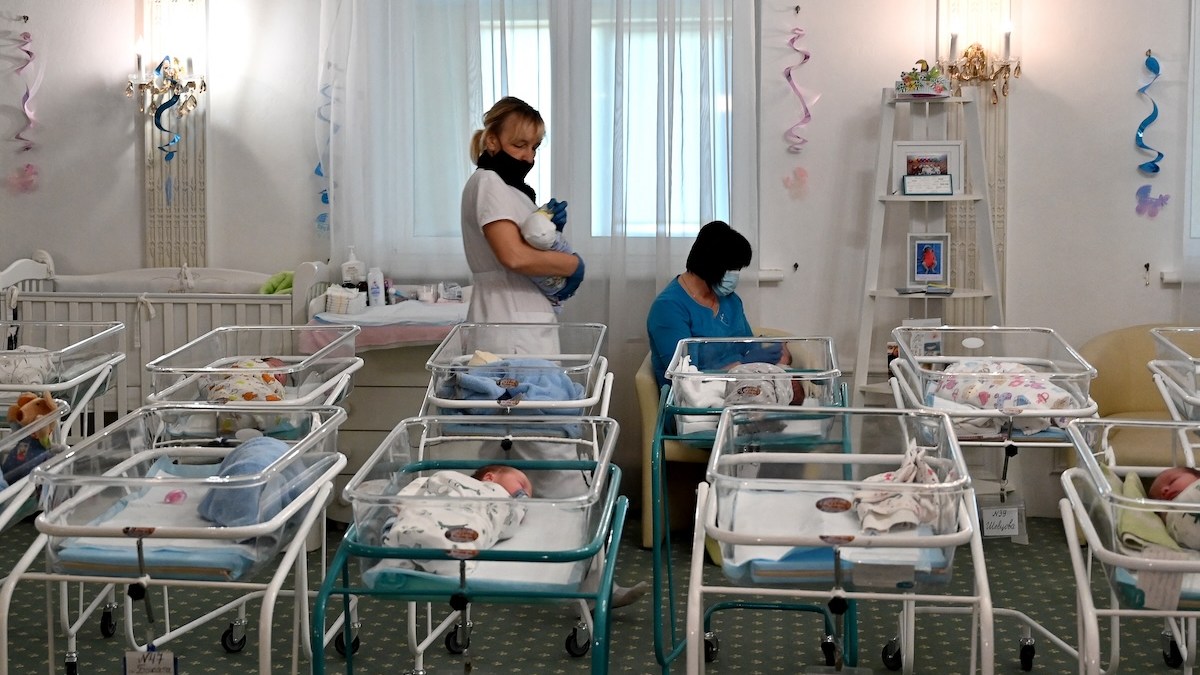 Babies wait to get picked up in Kyiv