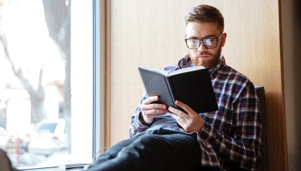 young-man-student-book-read-