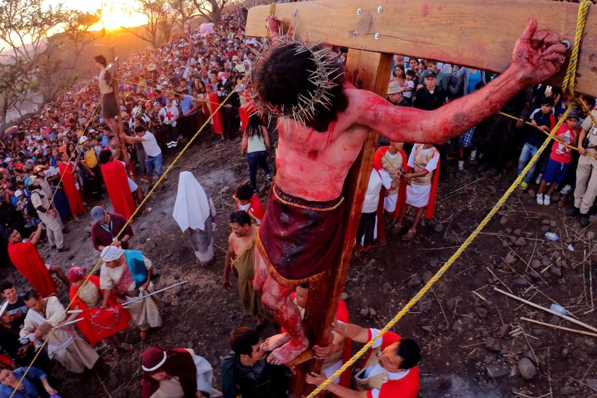 People take part in a performance of "The Passion of Jesus" Good Friday in San Pedro Tiaquepaque, Mexico, on April 7, 2023