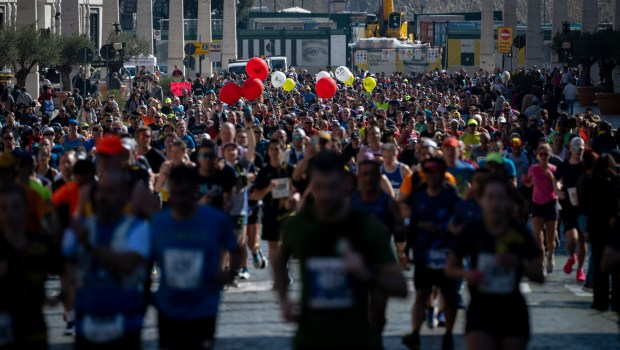 Competitors run in front of St. Peter's square during the Rome Marathon in Rome
