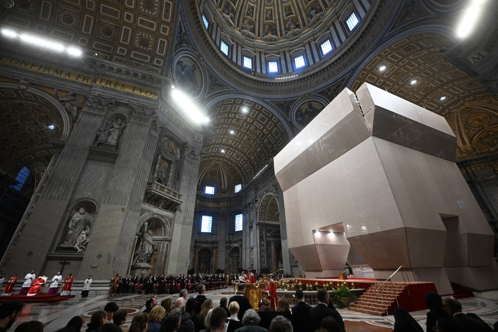 Pope Francis presides the Passion of the Lord mass on Good Friday as part of the Holy Week celebrations, at St Peter's Basilica in the Vatican on March 29, 2024