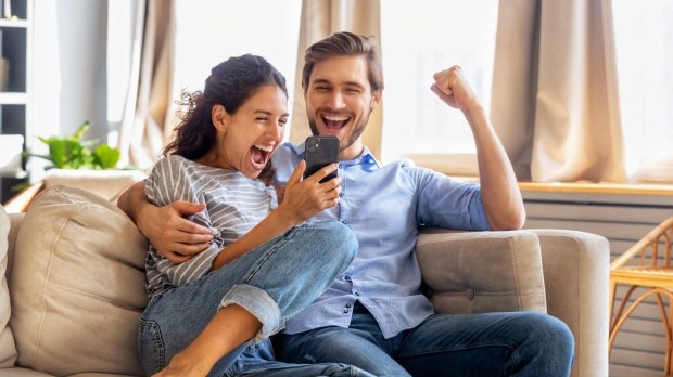 Couple celebrating good news