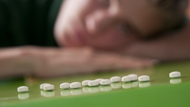 Teen lines up pills