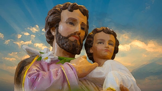 St. Joseph and young Jesus in front of clouds