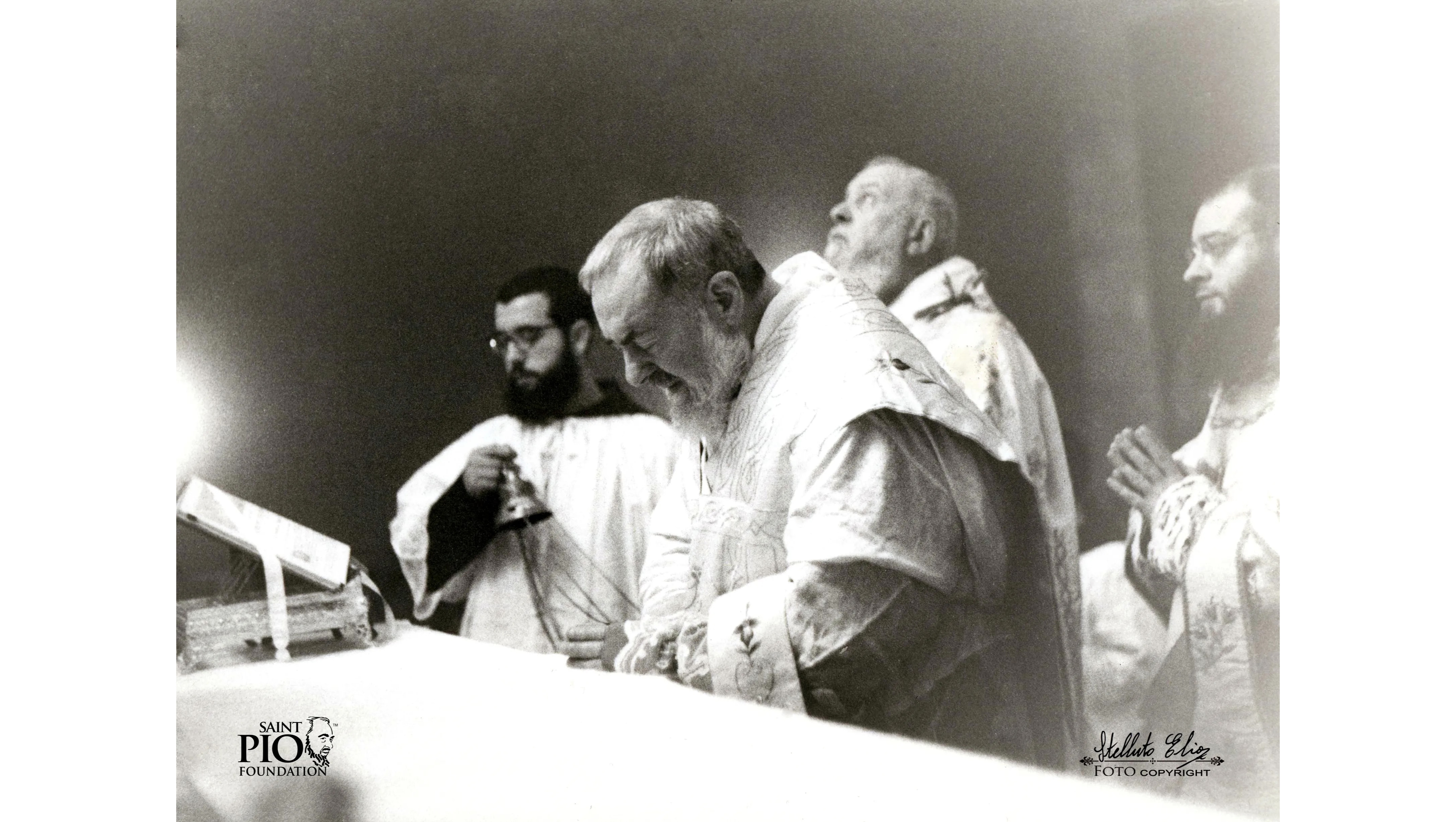 Black and white photo of Padre Pio celebrating Mass, taken by Elia Stelluto, published by the Saint Pio Foundation