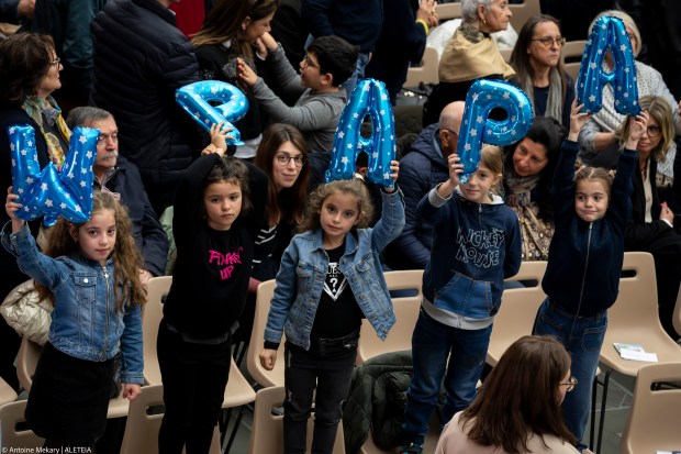 Pope Francis attends "The Caress and the Smile" event to meet with grandparents, the elderly, and grandchildren at the Vatican's Paul VI Audience Hall.