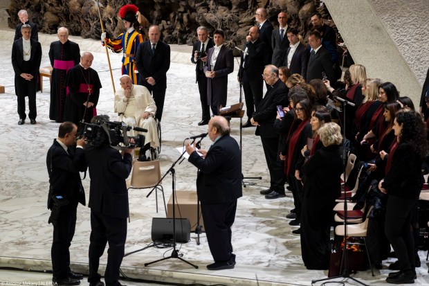 Pope Francis attends "The Caress and the Smile" event to meet with grandparents, the elderly, and grandchildren at the Vatican's Paul VI Audience Hall.