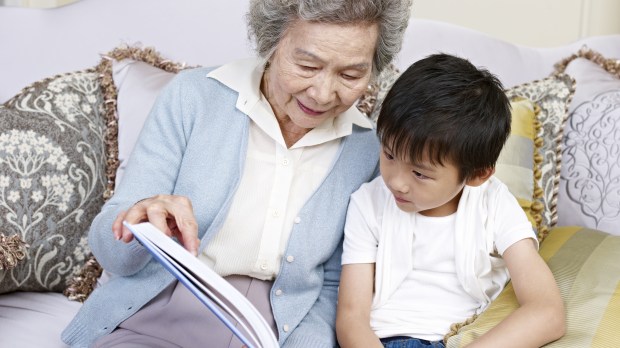 Grandma reads grandson