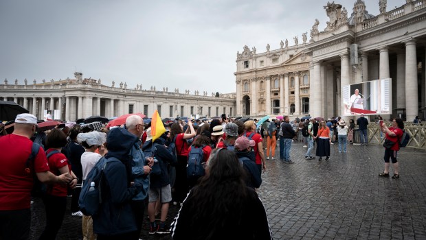 Pope Francis addresses the crowd from the window of the apostolic palace overlooking St. Peter's square during the Regina Coeli prayer on May 19, 2024 in The Vatican.