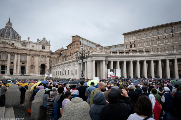Pope Francis addresses the crowd from the window of the apostolic palace overlooking St. Peter's square during the Regina Coeli prayer on May 19, 2024 in The Vatican.