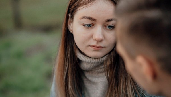 Sad woman having conversation with friend