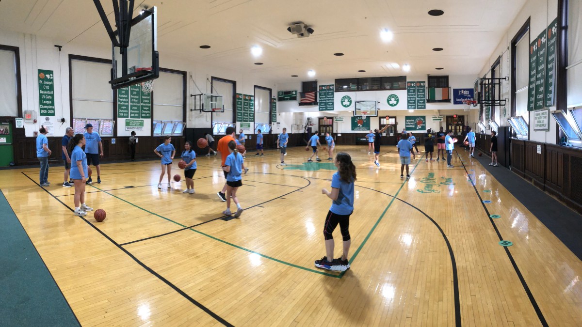 (Slideshow) Joyous basketball clinic for adults with autism