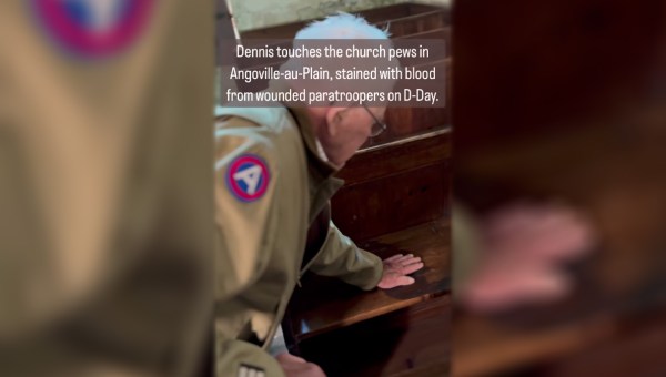 Dennis-touches-the-church-pews-in-Angoville-au-Plain