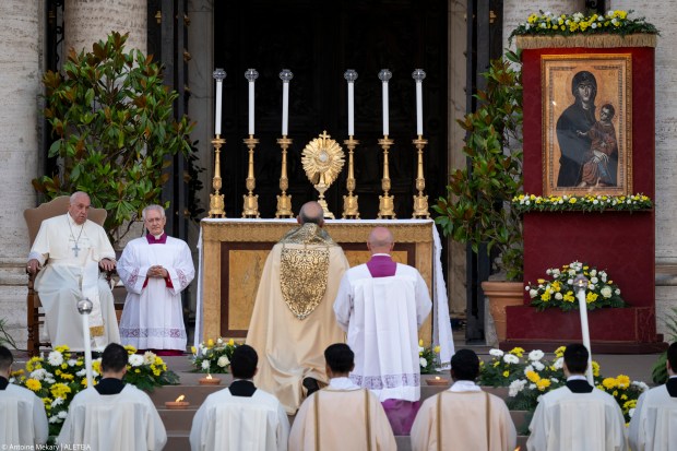 Pope Francis presides over the Corpus Christi ceremony outside Saint Mary Major basilica after a procession arrived from Saint John in Lateran basilica, on June 2, 2024 in Rome.