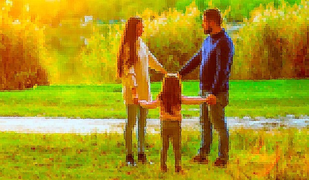 Family outdoors holding hands digitized